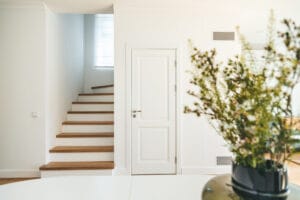 White corridor with a staircase